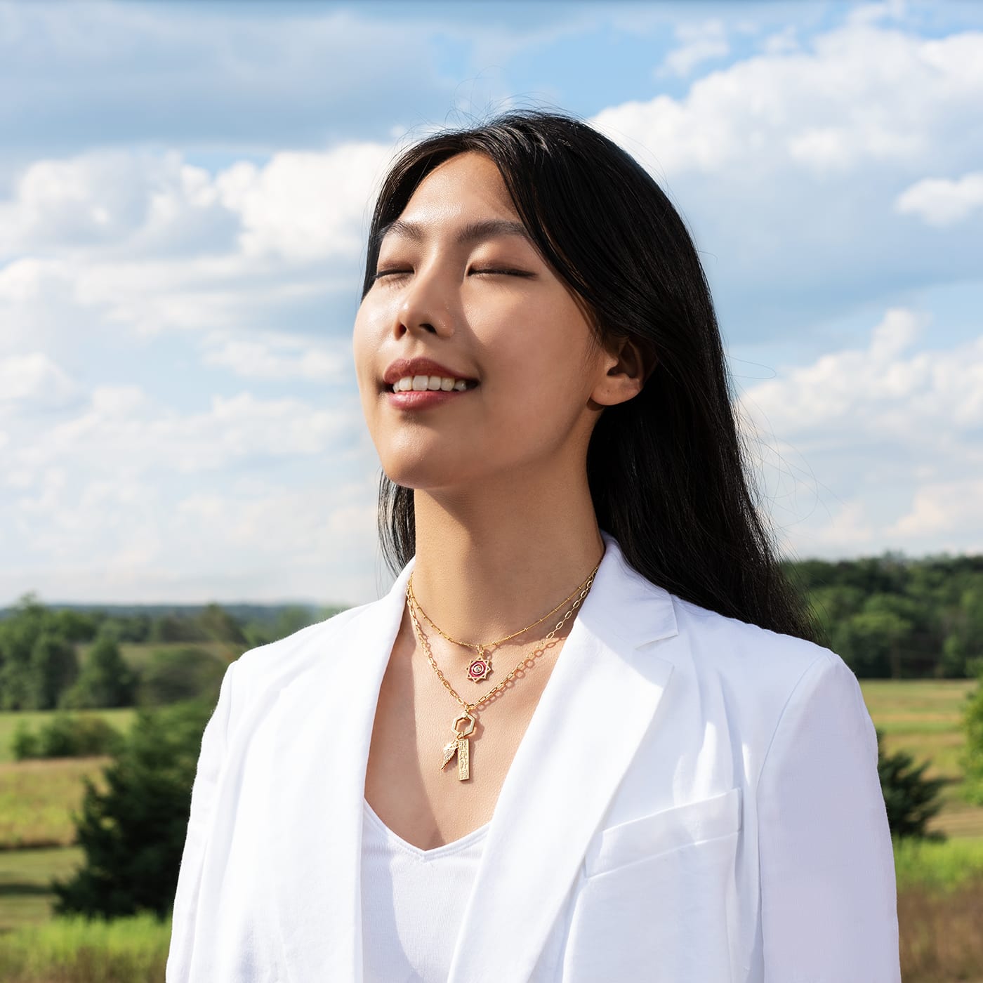 Twirling Handkerchief Charm Gold Layered Lifestyle Model Image | Shen Yun Collections 